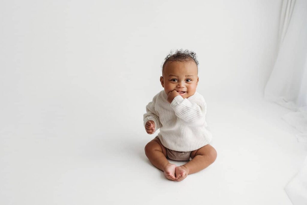 infant photography atlanta, simple and timeless portraiture, how to shoot white portraits on white, photographer atlanta, baby boy photographed in studio with a white backdrop, photoshoot in atlanta, milestone portraits atlanta ga