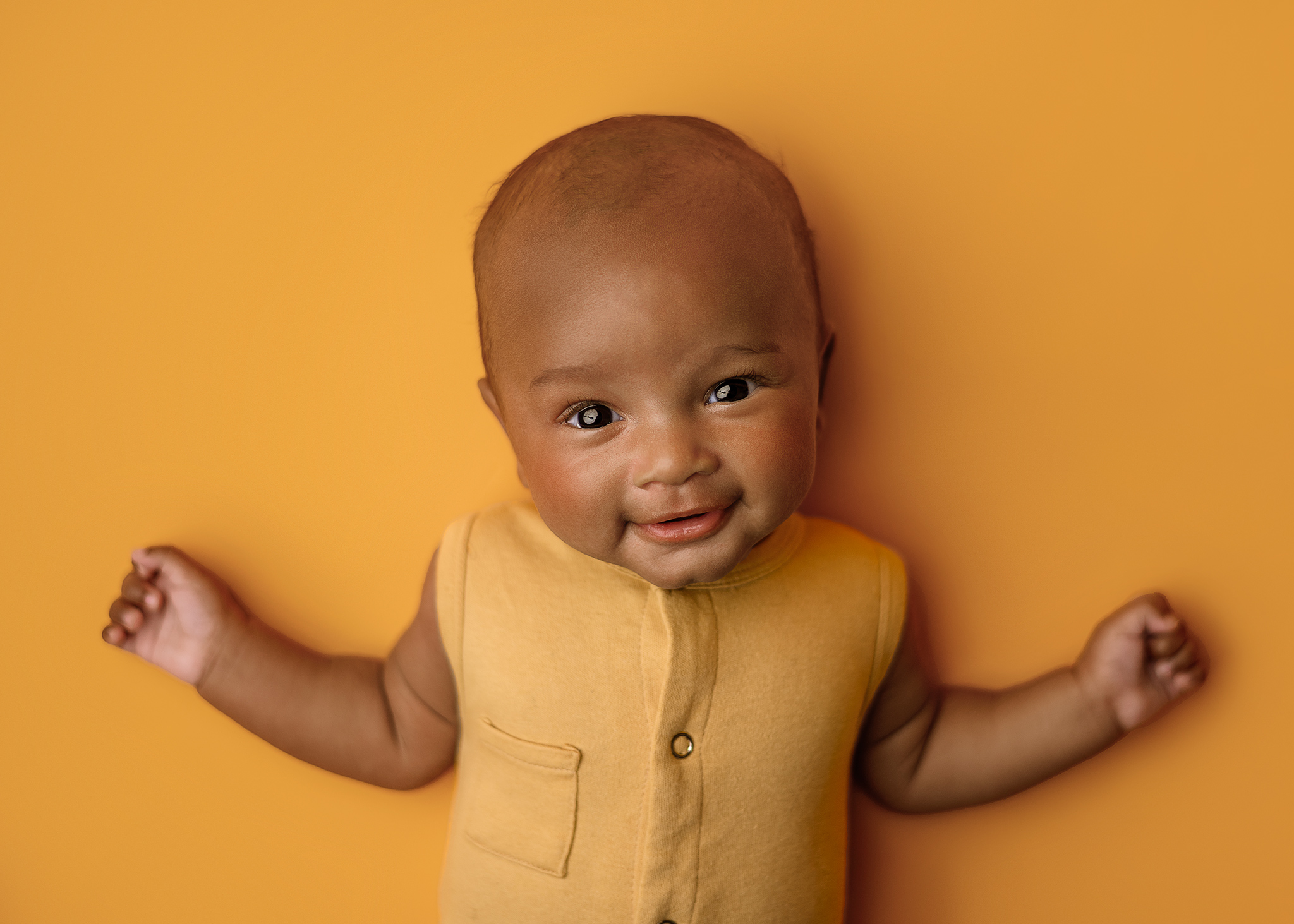 baby posed on yellow for studio session, baby photographer lincoln nebraska, studio photography lincoln nebraska, crete baby photographer, eagle nebraska photography, omaha baby photography